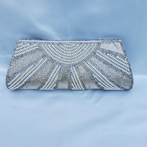 Blingy silver beaded sequin clutch